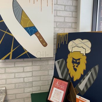 El Sazon Tacos & More - a chef with a knife - Tacos Near Me - Eagan, Minnesota