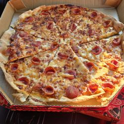 Pizza Hut - Pepperoni thin crust. My favorite!!