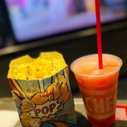 The Kitchen at CUT! - Cypress - Small buttery popcorn with a large frozen strawberry/watermelon margarita with a shot of patron. Yummy!