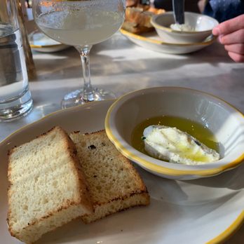 Nizza - Housemade ciabatta bread, ricotta and oil - Italian Near Me - New York, New York Nizza - Housemade ciabatta bread, ricotta and oil - Italian Near Me - New York, New York