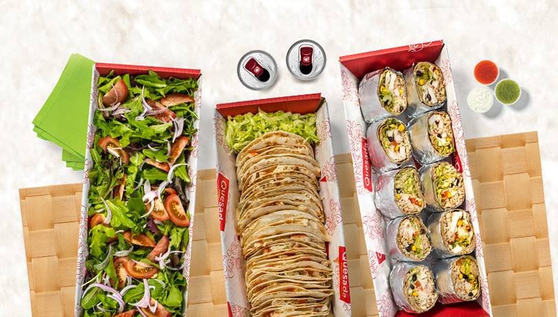 Quesada Burritos & Tacos Logo