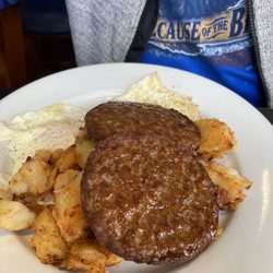 Blue Star Restaurant - Sausage patty with eggs over easy and home fries
