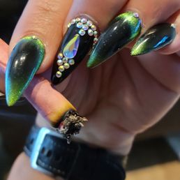 Wow. Love Super nails. I told her make me look like a bad bitch when I walk out. Well she did. And does every time. This is my spot.