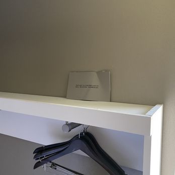 Hampton Inn Rockford - Bent tin sign broken off heating/cooling unit and propped up on wall. - Hotels Near Me - Rockford, Illinois Hampton Inn Rockford - Bent tin sign broken off heating/cooling unit and propped up on wall. - Hotels Near Me - Rockford, Illinois