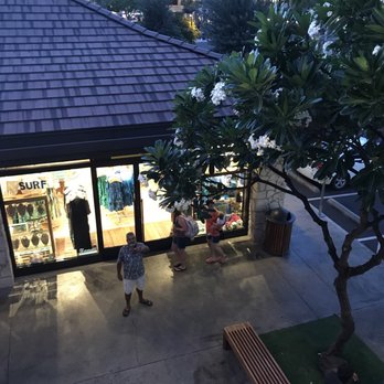 Monkeypod Kitchen - Plumeria trees and the courtyard below. - Hawaiian Near Me - Kapolei, Hawaii Monkeypod Kitchen - Plumeria trees and the courtyard below. - Hawaiian Near Me - Kapolei, Hawaii