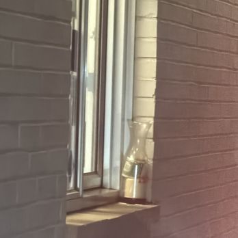 Tropical Grille - Mauldin - This is the tip jar outside the window. No wonder is nothing in it. - Cuban Near Me - Mauldin, South Carolina
