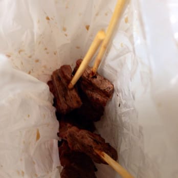 Palace Saimin - Looking into bag of bbq stcks - Japanese Near Me - Honolulu, Hawaii Palace Saimin - Looking into bag of bbq stcks - Japanese Near Me - Honolulu, Hawaii