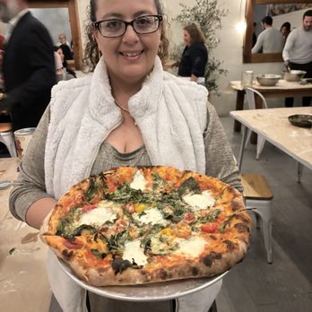 Bellas Bread and Butter - Sourdough Margarita Pizza with basil tomatoes and arugula - Bakeries Near Me - Los Angeles, California Bellas Bread and Butter - Sourdough Margarita Pizza with basil tomatoes and arugula - Bakeries Near Me - Los Angeles, California