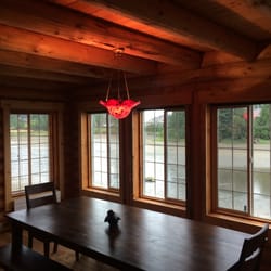 Emerald State Electric - Lighting in a custom log cabin. All wiring roughed in during construction and concealed in channels routed into logs.