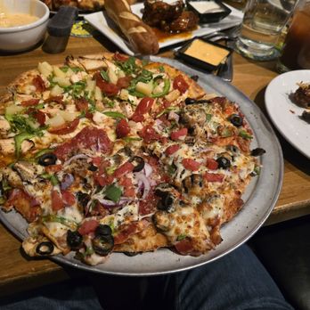 Crafters Pizza and Drafthouse - Half Mac Daddy, half Thai Island w/fried dough. - Pizza Near Me - Carmel, Indiana