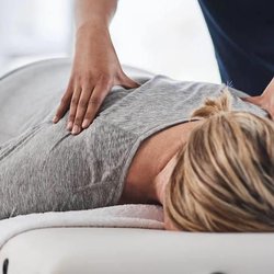 theBACKstop Massage & Oxygen Bar - Conveniently clothed table massage.