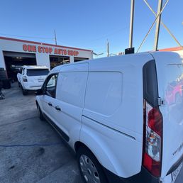 My Car being worked on at ONE STOP AUTO SHOP
