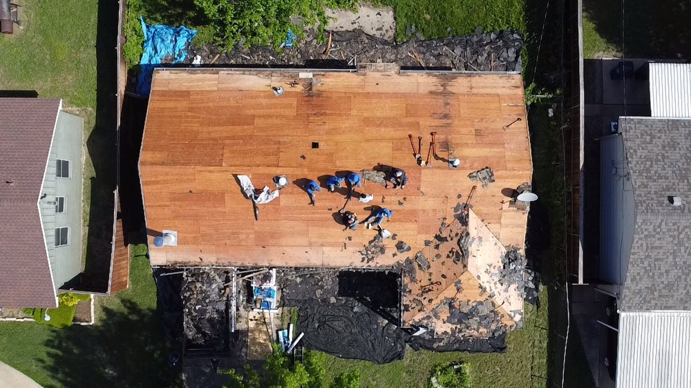 Slide of Rapid Roofing & Exteriors