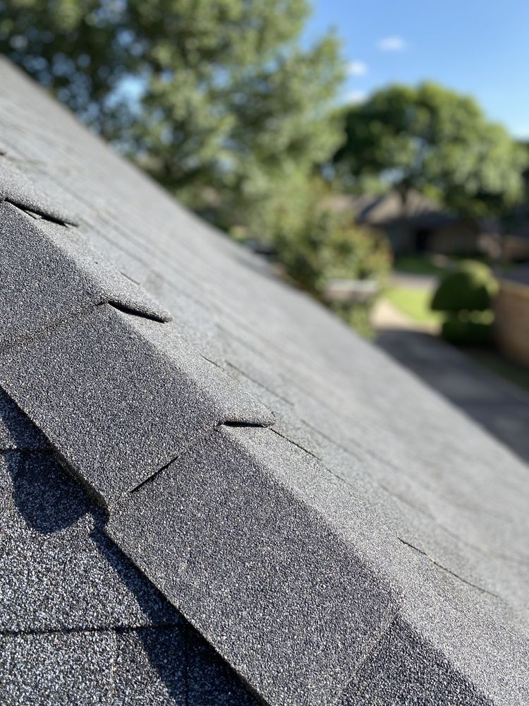 Slide of MLR Roofing Company