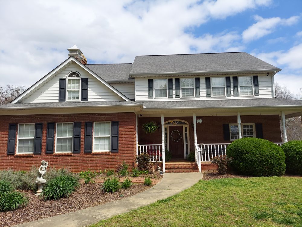 Slide of Accurate Roofing Pros