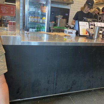 Chipotle Mexican Grill - Filthy Counter and cashier just keeps pushing it aside instead of cleaning it - Fast Food Near Me - Lakeville, Minnesota