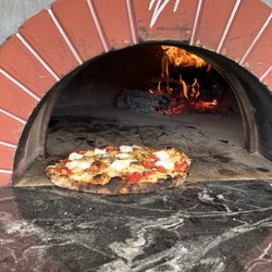 V’s Rolling Stone Wood fired Pizza