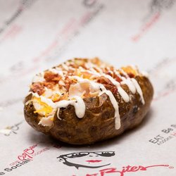 Grilled turkey breast, bacon, City Bites' ranch dressing, shredded cheddar & margarine.