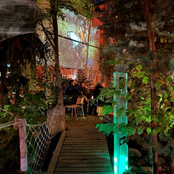 Forest Room 5 - Exterior w projector screen - Tapas Bars Near Me - Denver, Colorado