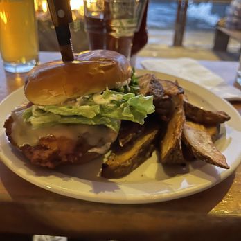 The Commonwealth - Chicken sandwich and potato wedges - Burgers Near Me - Snoqualmie Pass, Washington The Commonwealth - Chicken sandwich and potato wedges - Burgers Near Me - Snoqualmie Pass, Washington