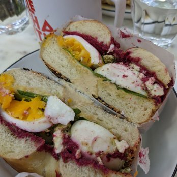 Elephantine Bakery - Eggs on simit with babaganoush, hummus, and beet labneh. - Bakeries Near Me - Portsmouth, New Hampshire Elephantine Bakery - Eggs on simit with babaganoush, hummus, and beet labneh. - Bakeries Near Me - Portsmouth, New Hampshire