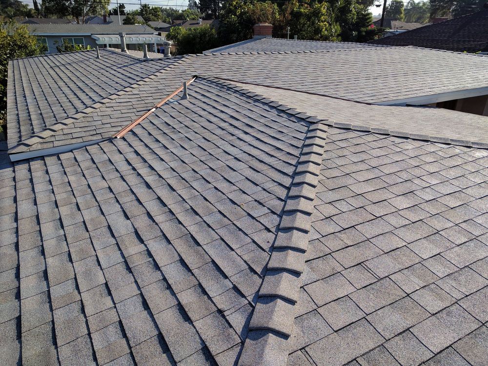 Slide of De Lorenzo's Guaranteed Roofing