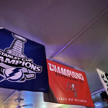 Dcoy Ducks - banners hanging from the ceiling - Dive Bars Near Me - Holmes Beach, Florida