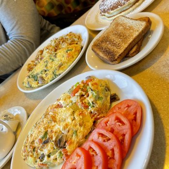 Cafe Fourteen - a plate of eggs, tomatoes and toast - Breakfast & Brunch Near Me - Palatine, Illinois Cafe Fourteen - a plate of eggs, tomatoes and toast - Breakfast & Brunch Near Me - Palatine, Illinois