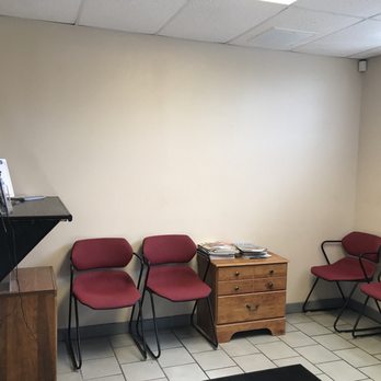 Orlando Import Auto Specialists - Waiting room with water and TV - Auto Repair Near Me - Orlando, Florida