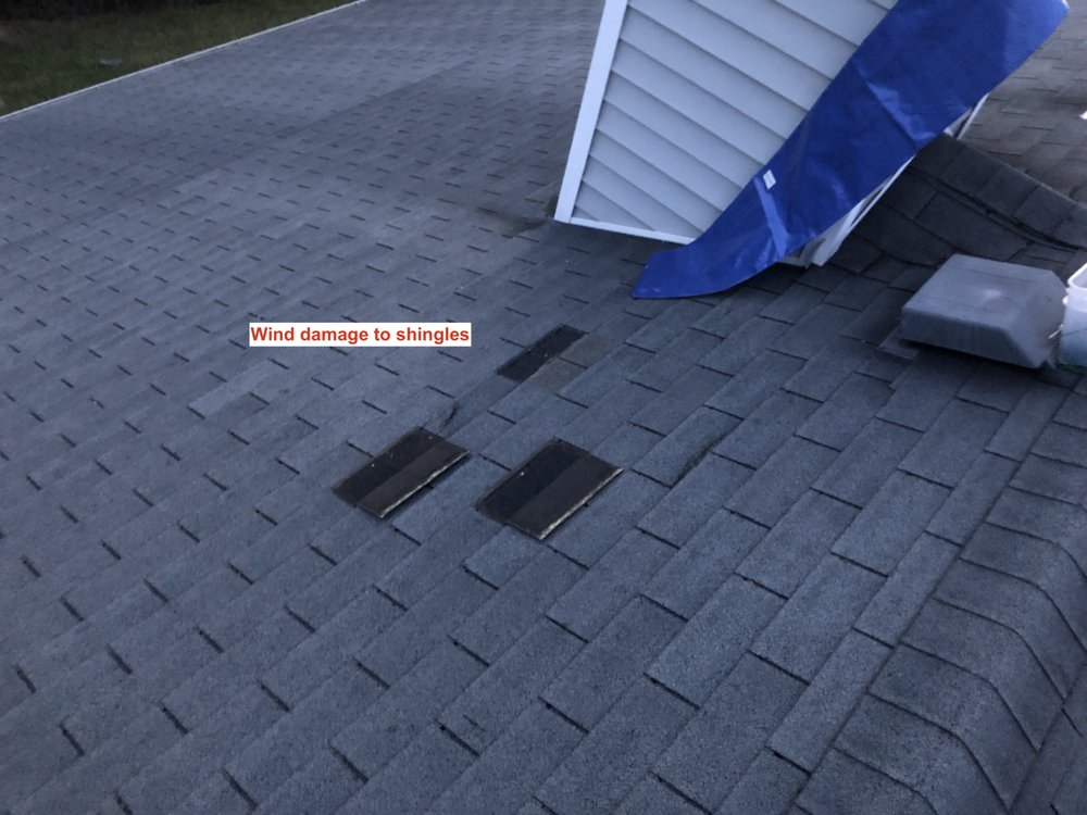 Slide of Grove Roofing