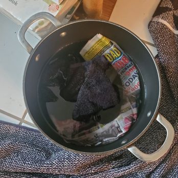 Chase Roofing - Pot full of water from the ceiling leaking. - Roofing Near Me - Pompano Beach, Florida