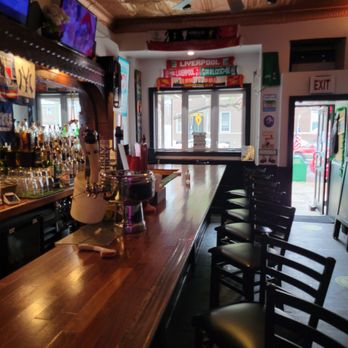 Shillelagh Tavern - a bar with chairs and a television - Sports Bars Near Me - Astoria, New York