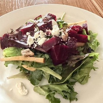 Persimmon Restaurant - Roasted Beet, Goat Cheese and Mesclun Salad with Julienne Apples, Candied Walnuts, Balsamic Vinaigrette and Port Reduction Drizzle - New American Near Me - Bethesda, Maryland