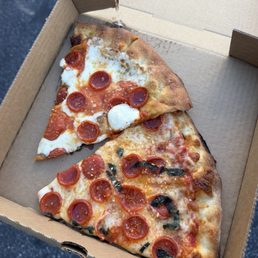Vodka and cupped pepperoni on top and hot honey cupped pepperoni Vodka and cupped pepperoni on top and hot honey cupped pepperoni