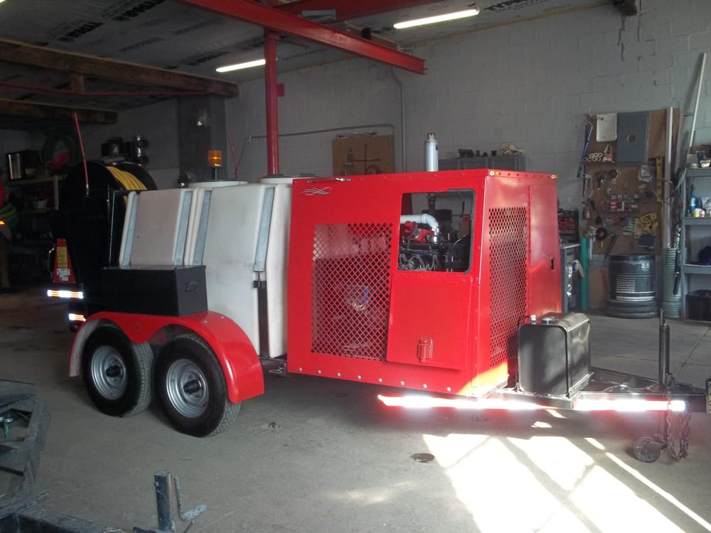 Slide of Roach and Family Septic Excavating & Drain Cleaning