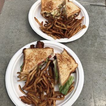 Steuben's Truck - two plates of fries and a sandwich - Caterers Near Me Steuben's Truck - two plates of fries and a sandwich - Caterers Near Me