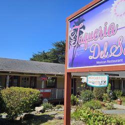 Taqueria Del Sol - Cute outdoor patio overlooking garden