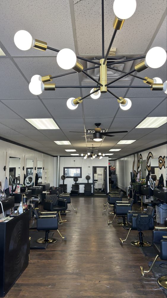 The LocsSmith Hair Studio Logo