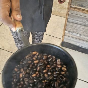 Shewa - The hostess roasting coffee beans. - Food Delivery Services Near Me - Washington, DC, District of Columbia Shewa - The hostess roasting coffee beans. - Food Delivery Services Near Me - Washington, DC, District of Columbia