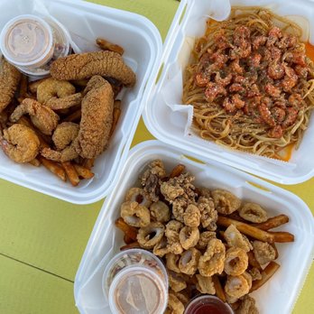 NOLA Cajun Kitchen - Catfish and Shrimp Basket (left), Crawfish Garlic Noodles (top right), Fried Calamari Basket (bottom right) - Cajun/Creole Near Me - West Boylston, Massachusetts NOLA Cajun Kitchen - Catfish and Shrimp Basket (left), Crawfish Garlic Noodles (top right), Fried Calamari Basket (bottom right) - Cajun/Creole Near Me - West Boylston, Massachusetts