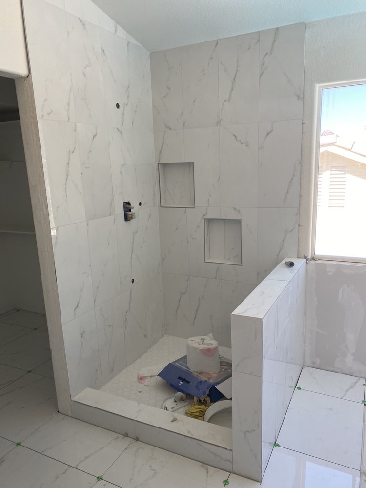 Slide of High Roller Painting & Remodelling