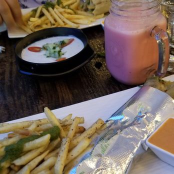 Paratha Wala - Parathan Lamb wrap with Desi Fries, raita and Rose Lassi. Delish! - Indian Near Me - Forest Hills, New York Paratha Wala - Parathan Lamb wrap with Desi Fries, raita and Rose Lassi. Delish! - Indian Near Me - Forest Hills, New York