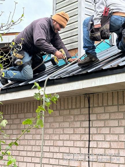 Slide of Big Fish Roofs & Restoration