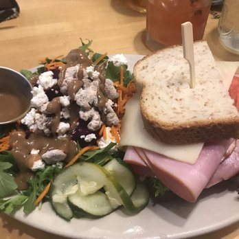 Five Loaves Cafe - 1/2 arugulasalad and 1/2 special sandwich of the day - American Near Me - Mt Pleasant, South Carolina