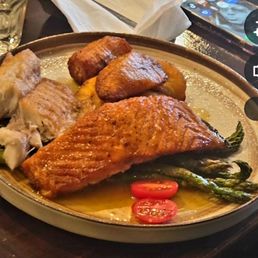 Salmon a la Maracua with Asparagus, plantain, and a passion fruit sauce (on the left is a piece of the Sea Bass) Salmon a la Maracua with Asparagus, plantain, and a passion fruit sauce (on the left is a piece of the Sea Bass)