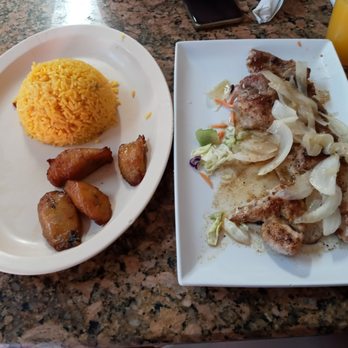 Tropical Beach Cafe - This was the pork steak plate. $9.99 or could be $25.99 if they feel like you should pay that. - Cuban Near Me - Miami Beach, Florida