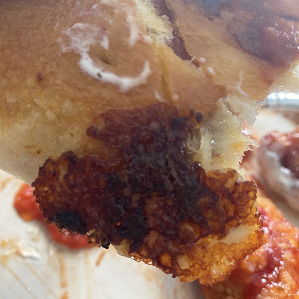 Carsonie's - Ok y'all know how we all love that crispy crunchy cheese on dang near anything? The whole Stromboli bottom was covered with it. - Pizza Near Me - Westerville, Ohio
