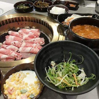 E.M. Bop - Lots of side dishes are one of reasons why I thumbs up E M Bop! See the sweet red color of beef! It's very delicious as well! - Korean Near Me - Duluth, Georgia