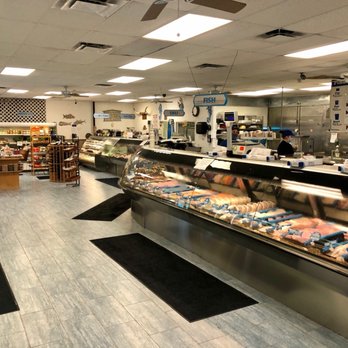 Pinders Seafood & Marketplace - the inside of a restaurant - Seafood Markets Near Me - Jupiter, Florida