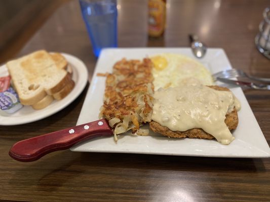 Photo of Cowgirls Cafe - Santa Ana, CA, US. Country-fried steak with sausage gravy